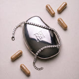 THE CAPSULE COMPACT